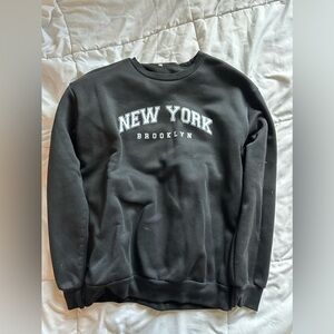 Black crewneck
